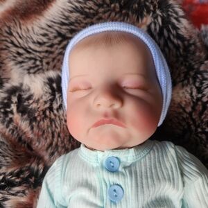 Realistic reborn baby doll dressed